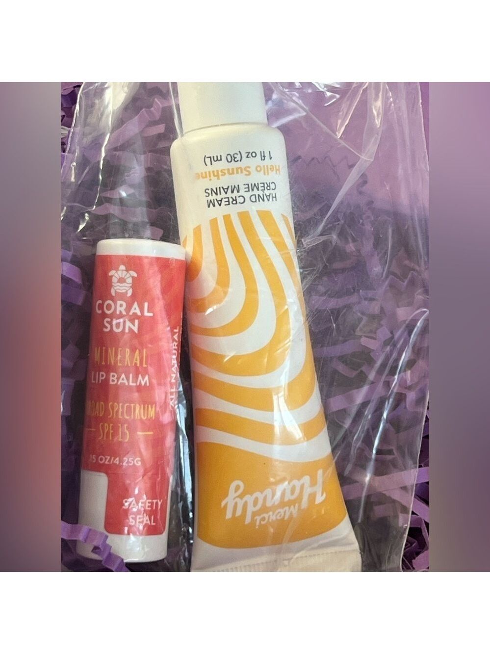 Coral Sun Lip Balm and Merci Handy Hand Cream in Hello Sunshine